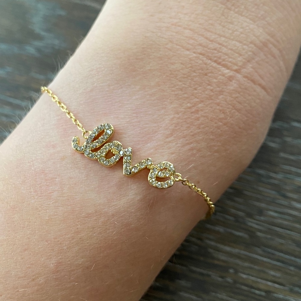 3/$9 love simple gold bracelet. Great condition